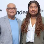 Delilah Fishburne with her parents Laurence Fishburne and Gina Torres at a public event