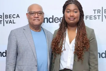 Delilah Fishburne with her parents Laurence Fishburne and Gina Torres at a public event