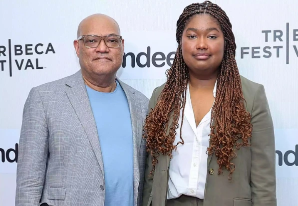 Delilah Fishburne with her parents Laurence Fishburne and Gina Torres at a public event